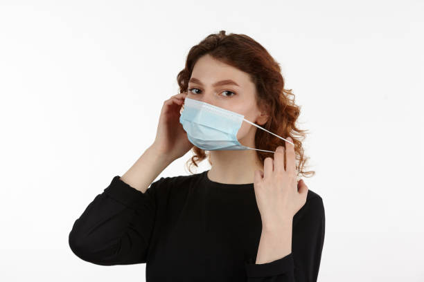istock Girl with a mask. 1388141854