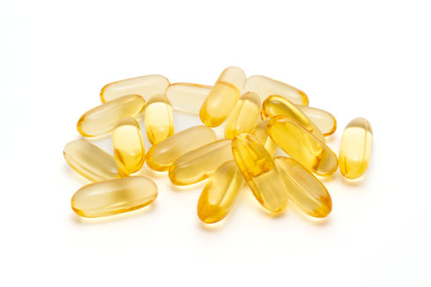 istock dietary supplement oil capsules on a white background 1388143184