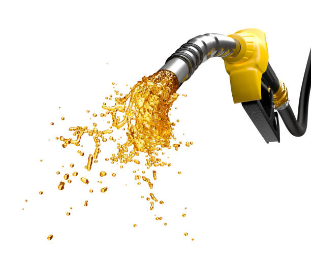 istock Gasoline gushing out from yellow pump 1388148100