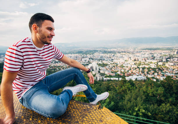istock Man viewing the city panorama from above 1388150047