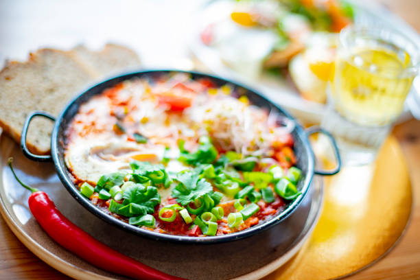 istock Egg shakshouka dish on a restaurant table 1388150140