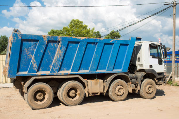 istock Large cargo dump truck on a construction site 1388151788