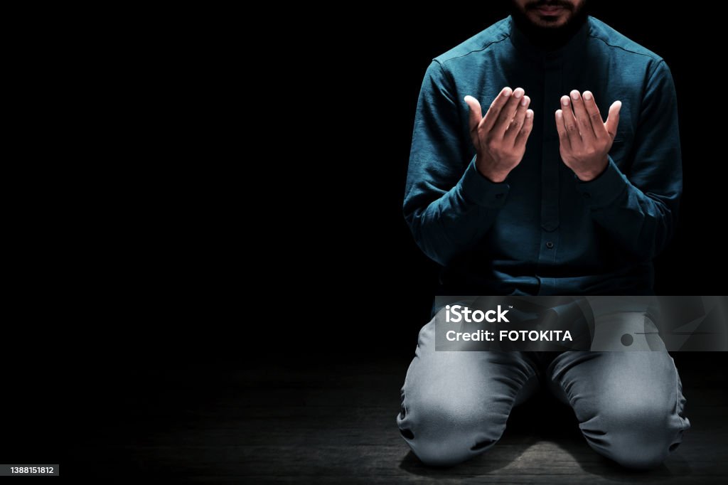 Muslim man praying in the mosque Islam Stock Photo
