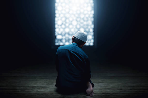 istock Muslim man praying in the mosque 1388151821