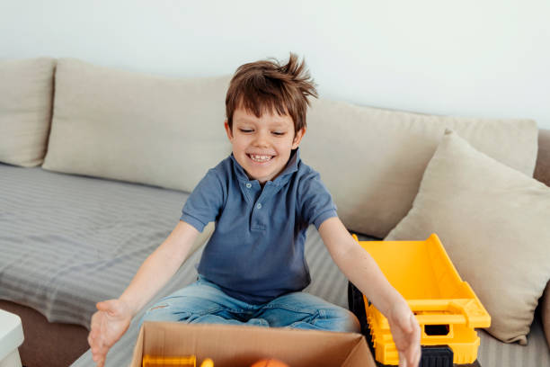 istock Boy with donation box for Ukraine kids. 1388154486
