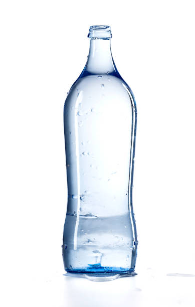 istock Front view glass water bottle isolated on white background. 1388158733
