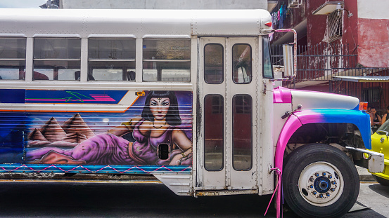 Panama City, Panama-April 2018: Beautiful and colourful public transportation buses with traditional drawings and decoration recognizable and famous around the world are one of the trademarks of the city.