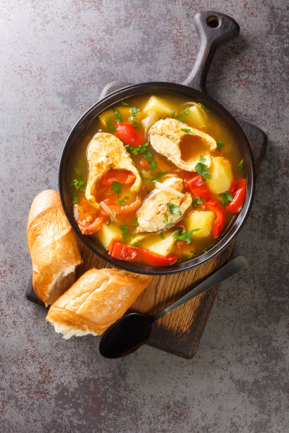 istock Portuguese fish stew Caldeirada de Peixe close-up in a bowl. Vertical top view 1388163392