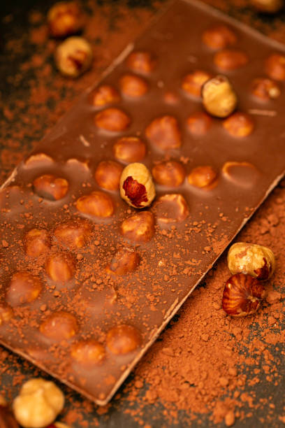 istock Chocolate with hazelnuts and cocoa powder 1388164201