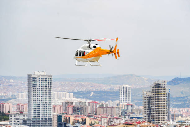 A commercial helicopter flies close over Ankara.