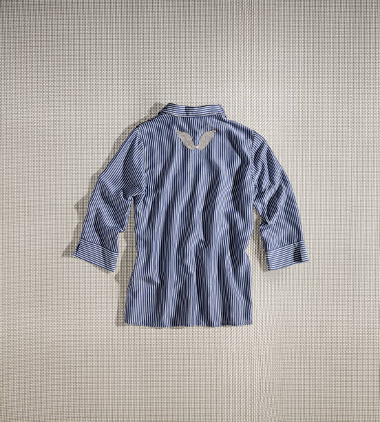 Striped shirt isolated on textured background (with clippin path)