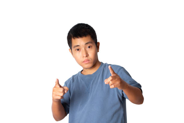 istock Man pointing with his fingers against isolated on white background. 1388168842