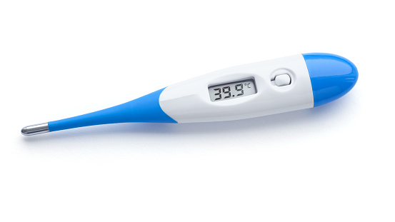 A medical digital thermometer shows 39.9 degrees fever