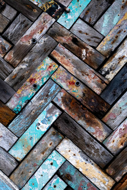 istock Weathered pieces of wood abstract design texture 1388169133