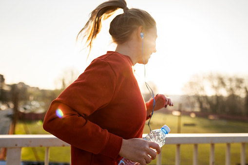 Young fit woman enjoying exercise