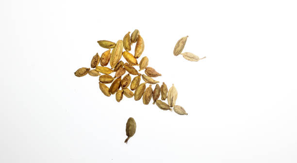 istock Cardamom isolated on a white background with clipping path Cardamon selected focus. Indian Masala ingredient. 1388173346