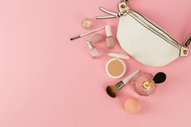 istock cosmetics and bag on pink background 1388174312