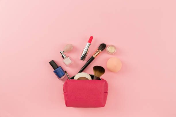 istock cosmetics and bag on pink background 1388174340