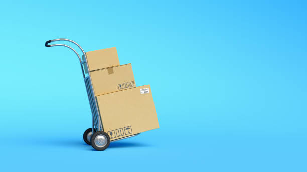 istock Hand truck with cardboard boxes on blue background. Moving house concept. Relocation, cargo delivery, logistics and distribution. Warehouse. Minimal composition. 3d illustration. 3d render. 1388174955