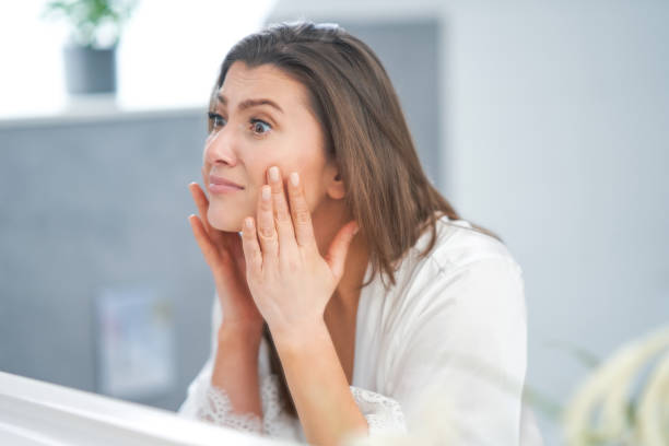 istock Young nice brunette woman in the bathroom 1388177970