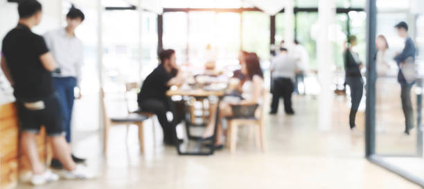 istock Abstract blurred interior modern work space with people working, banner background with copy space. 1388178158