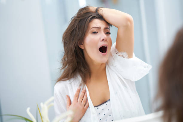 istock Young nice brunette woman in the bathroom 1388178334