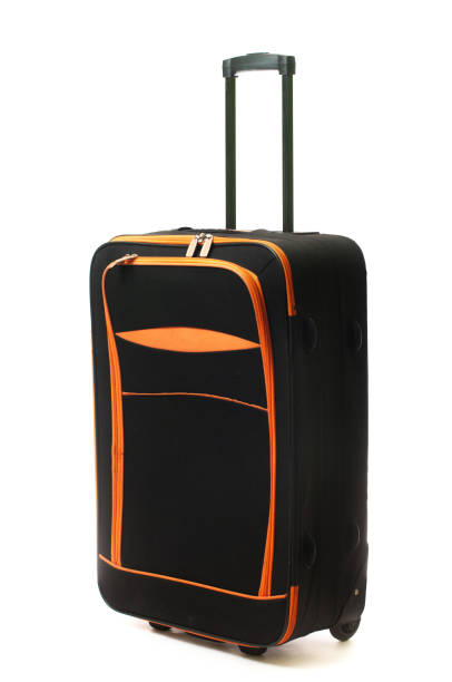 istock Travel black suitcase isolated on white background. 1388179861