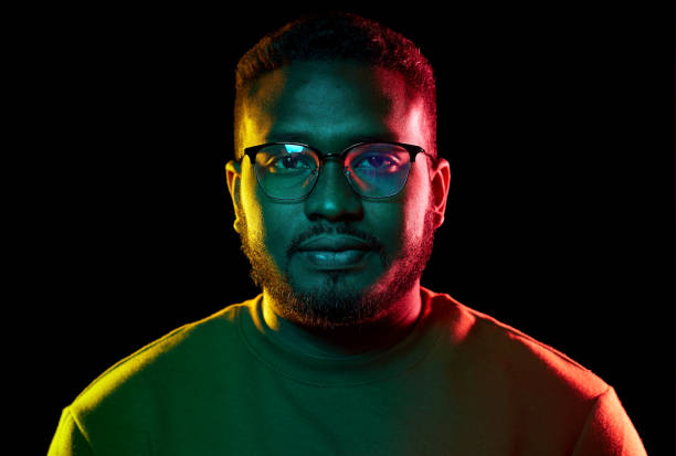 istock young african american man in glasses over black 1388181140
