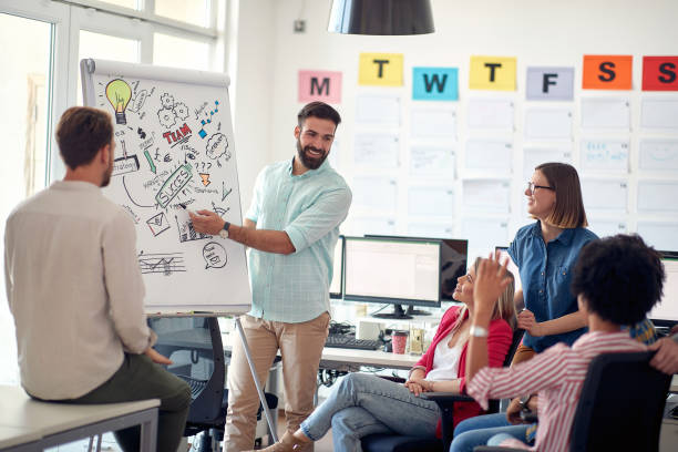 istock Group of multiethnic ambitious employees brainstorming together 1388181805