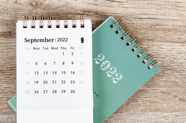 istock September 2022 desk calendar on wooden background. 1388183290
