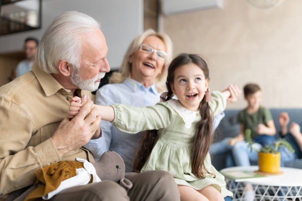 istock Old senior couple with grand daughter 1388183399