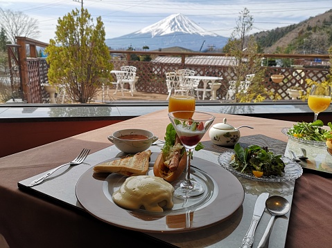 Japanese breakfast with sandwich,salad, tea, orange juice with Mt Fuji view