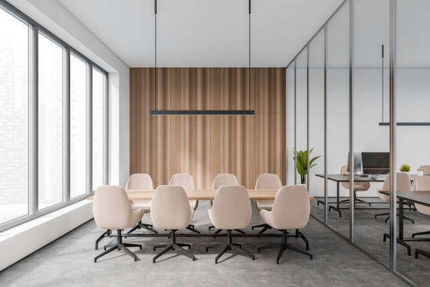 istock Front view on bright office room interior with meeting board 1388187764