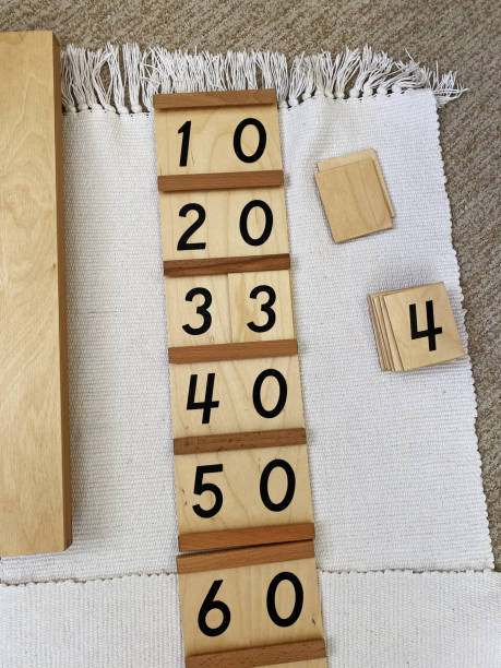 istock Montessori material Segen wood board # 1 with golden material 1388187876