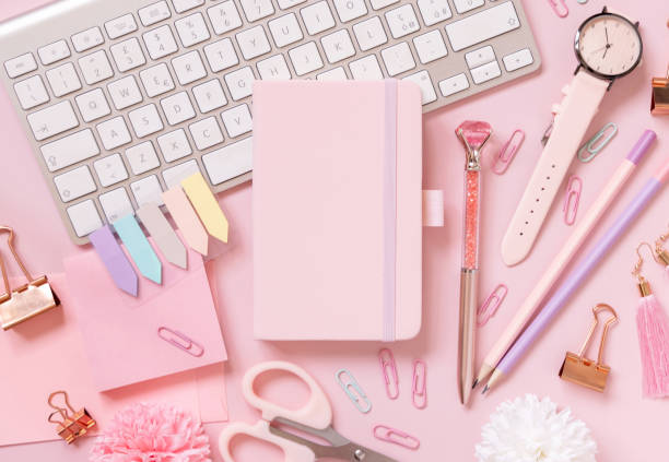 istock Notebook, Pink school girly accessories and keyboard on pastel pink Top view, mockup 1388188201