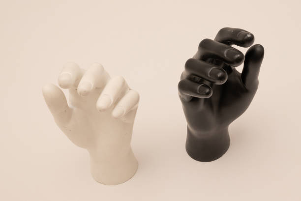 istock Old shabby mannequin hands on a white background 1388188388