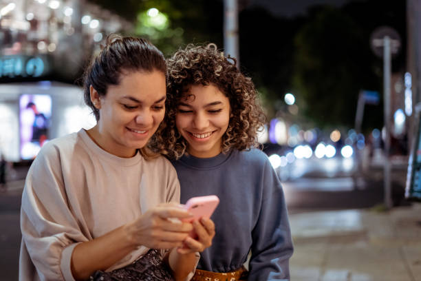 istock Looking at social media 1388188962
