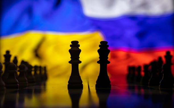 istock War between Russia and Ukraine, conceptual image of war using chess board, pieces and national flags on the background. Ukrainian & Russian crisis, political conflict. Stop the war 2022 1388189135