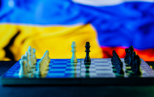 istock War between Russia and Ukraine, conceptual image of war using chess board, pieces and national flags on the background. Ukrainian & Russian crisis, political conflict. Stop the war 2022 1388189160