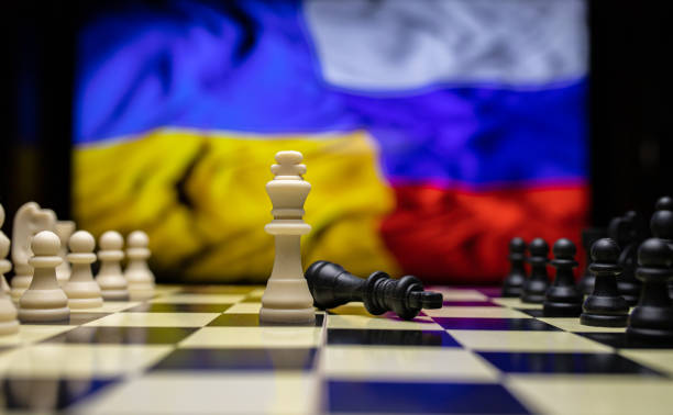 istock War between Russia and Ukraine, conceptual image of war using chess board, pieces and national flags on the background. Ukrainian & Russian crisis, political conflict. Stop the war 2022 1388189764