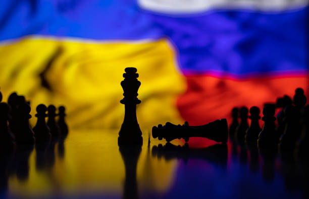 istock War between Russia and Ukraine, conceptual image of war using chess board, pieces and national flags on the background. Ukrainian & Russian crisis, political conflict. Stop the war 2022 1388189765