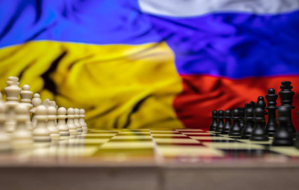 istock War between Russia and Ukraine, conceptual image of war using chess board, pieces and national flags on the background. Ukrainian & Russian crisis, political conflict. Stop the war 2022 1388189845