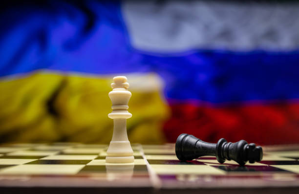 istock War between Russia and Ukraine, conceptual image of war using chess board, pieces and national flags on the background. Ukrainian & Russian crisis, political conflict. Stop the war 2022 1388189923