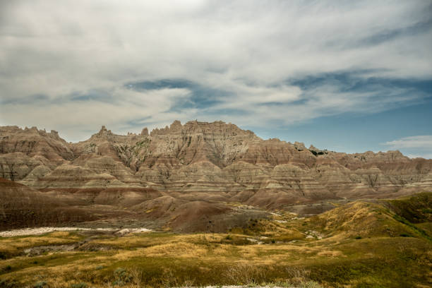 istock Grassy Valley Turns Into Dramatic Badlands Formations 1388190195
