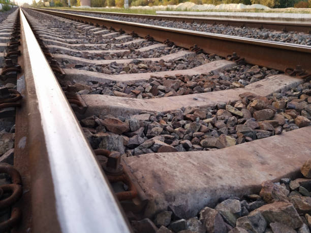 Railway Track, Sleepers and Ballast - Close Up Railroad straight track. tramway track stock pictures, royalty-free photos & images