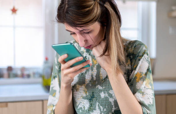 istock A visually impaired young woman  using smart phone. 1388194210