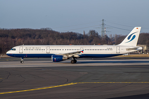 Düsseldorf, Germany - January 09, 2005: Blue Wings Airbus A321 at the line-up shortly before Take-Off