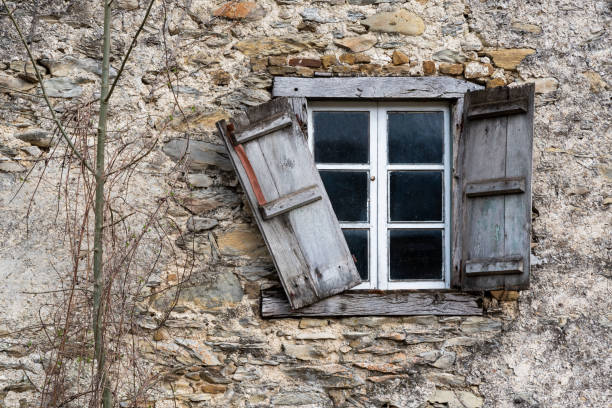 istock Abandoned rural house window 1388195283