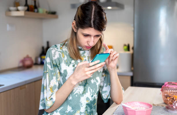 istock A visually impaired young woman  using smart phone. 1388195376