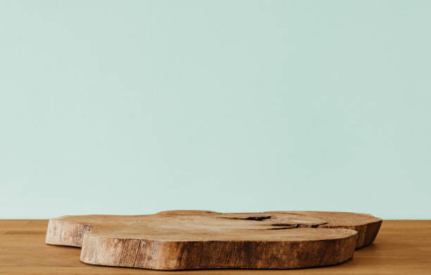 istock Wooden slice on wooden table and copy space 1388198526